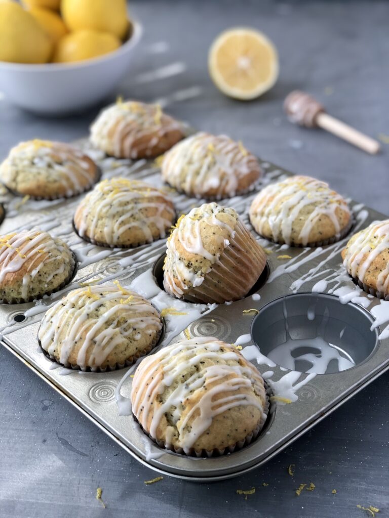 Lemon Poppy Seed Muffins iced in pan