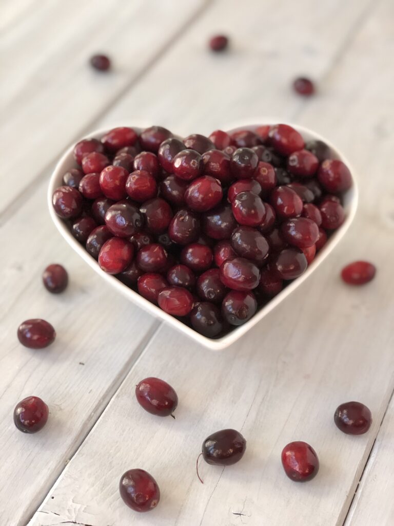 Cranberries in a heart-shaped bowl